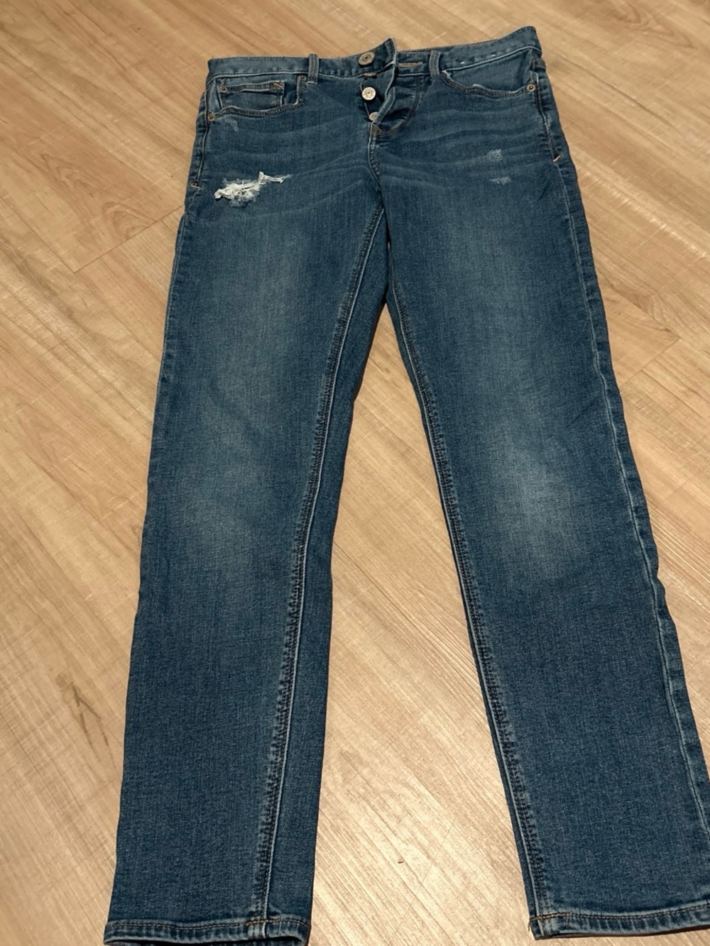 Express Women's Skinny Jeans in Dark Blue with Distressed Detail